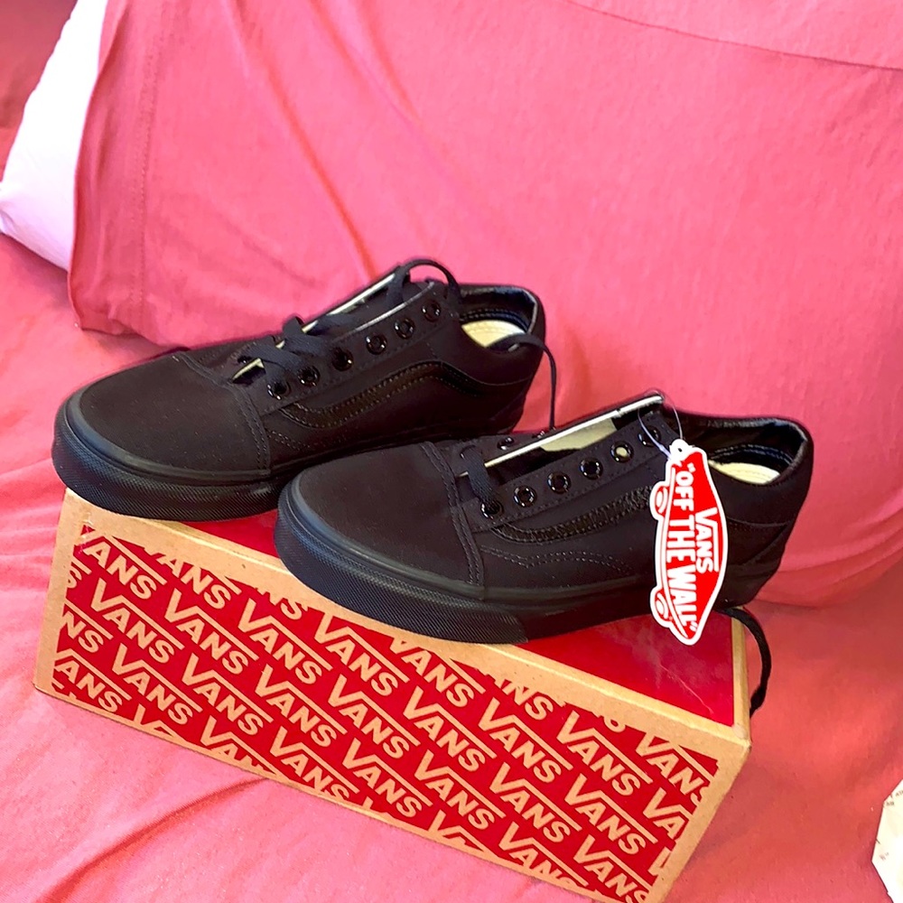 All black old school vans.